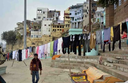 clothes amd animals were washing in ganga people silent