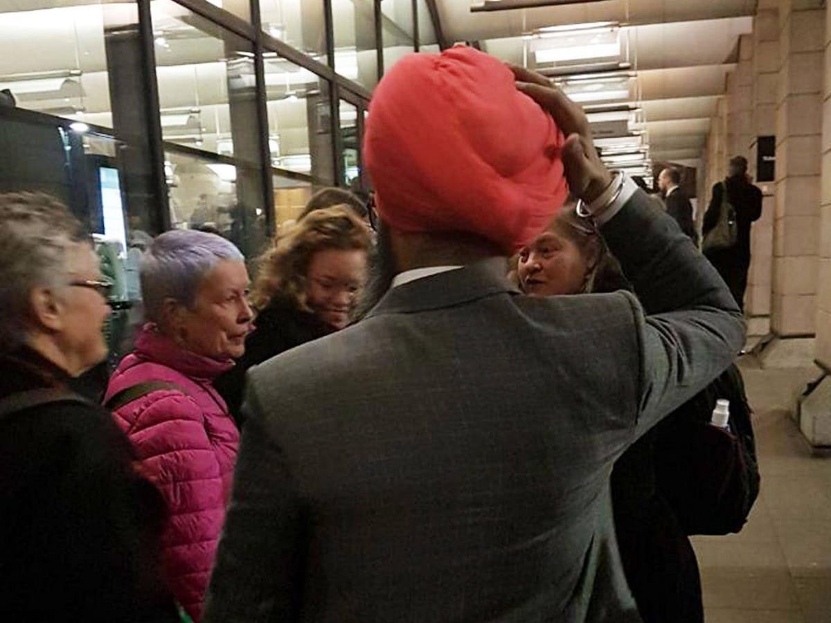 Indian sikh turban removed by english man outside the british parliament