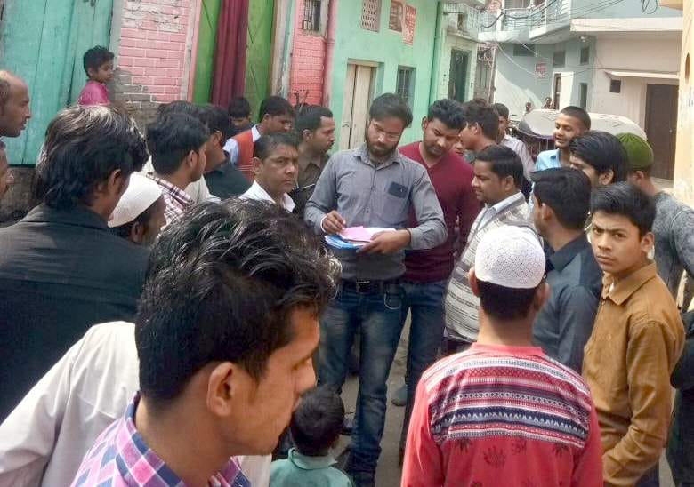 crowd jamed the way of electricity employee