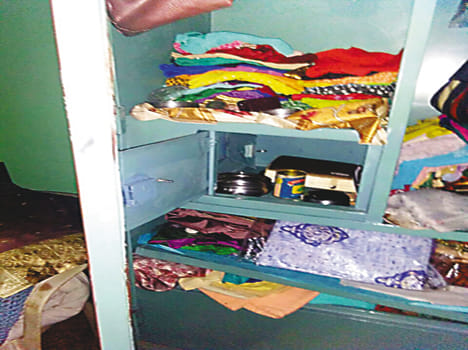 Cash and jewelery stolen from two closed houses