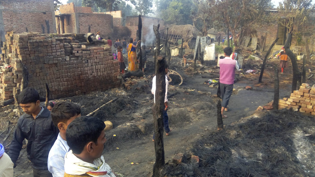 13 houses burnt in a dispute between husband and wife