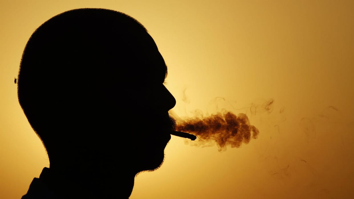 see what happened -  liquor thrown on a man when he was smoking