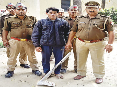 पुलिस की गिरफ्त में हत्या आरोपी। 