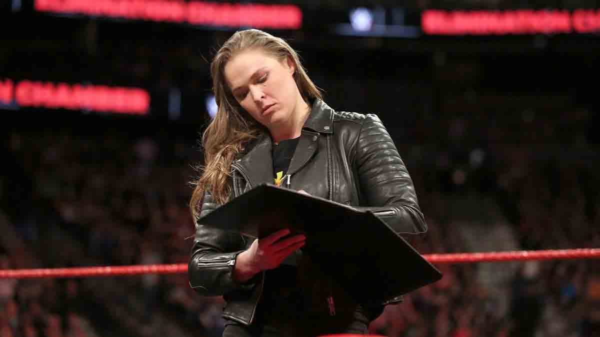 elimination chamber 2018 Ronda Rousey signs WWE contract after putting Triple H into the table