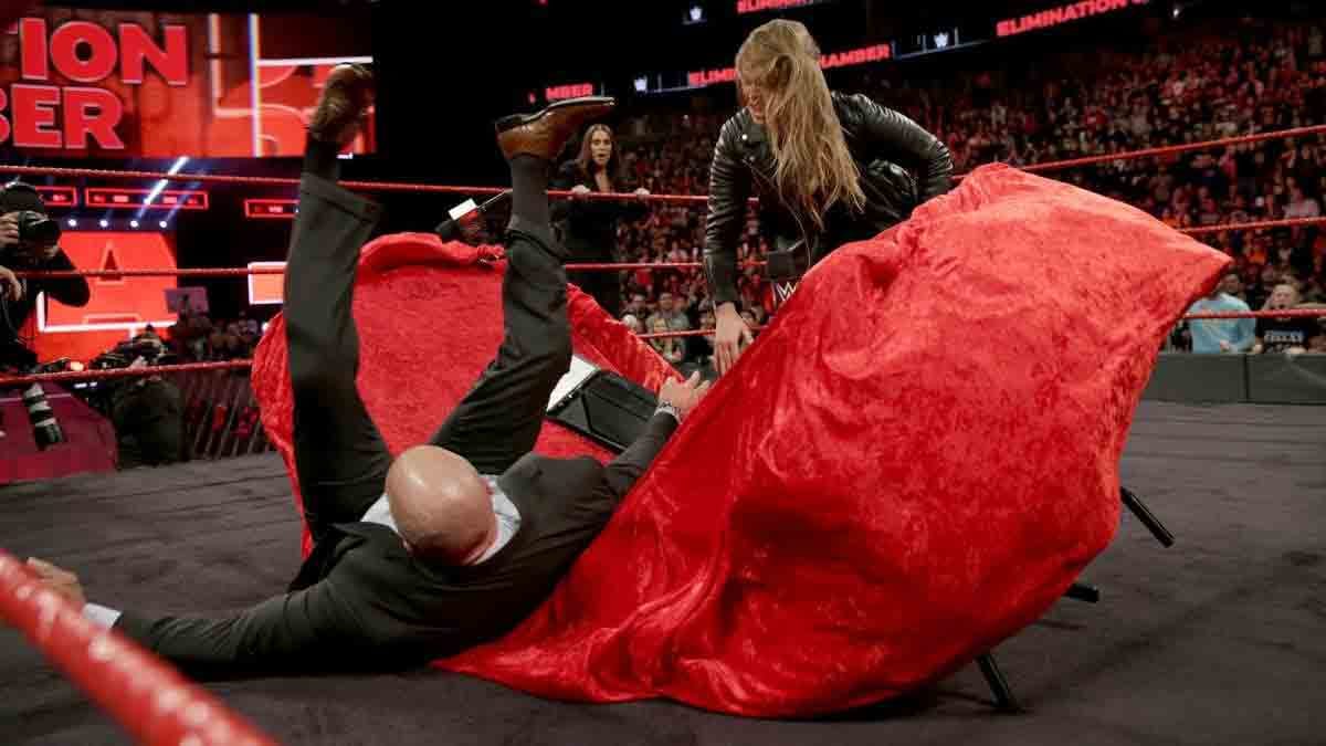 elimination chamber 2018 Ronda Rousey signs WWE contract after putting Triple H into the table