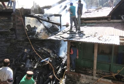 three houses gutted in a major fire at kullu himachal