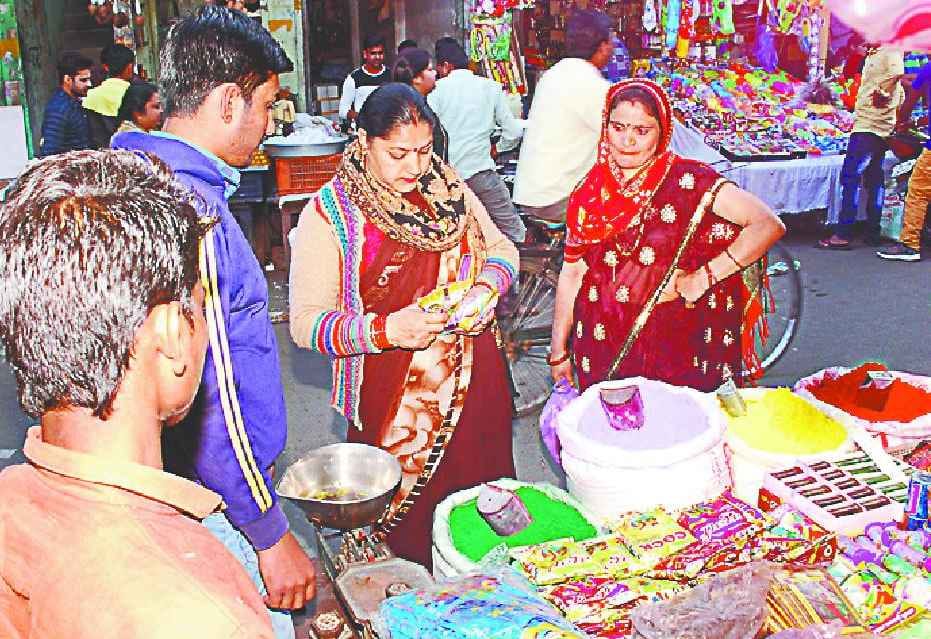 The buoyant market on holi, trader sneakers