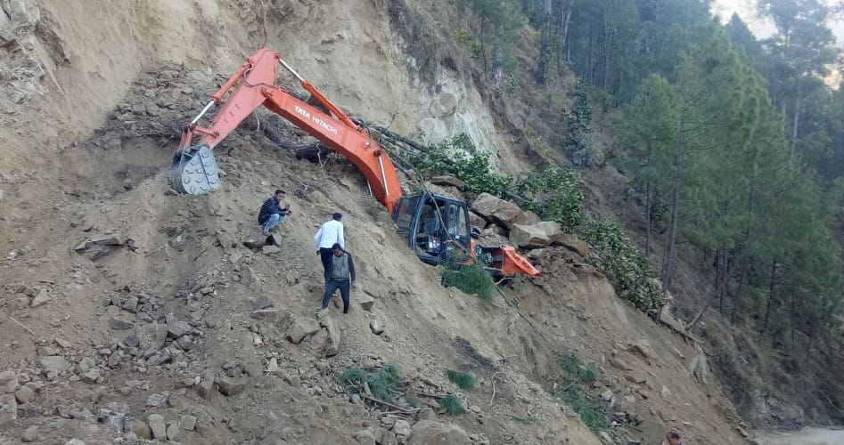 Poklane machine wrecked during road construction