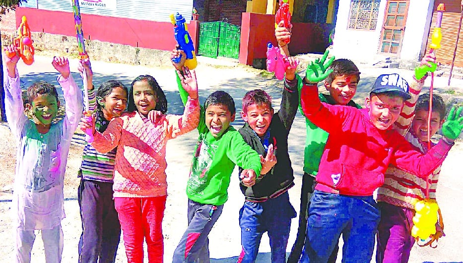 Children in DDihat immersed themselves in Holi