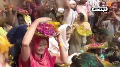 Watch: Foreign nationals celebrate ‘Flower Holi’ in Vrindavan