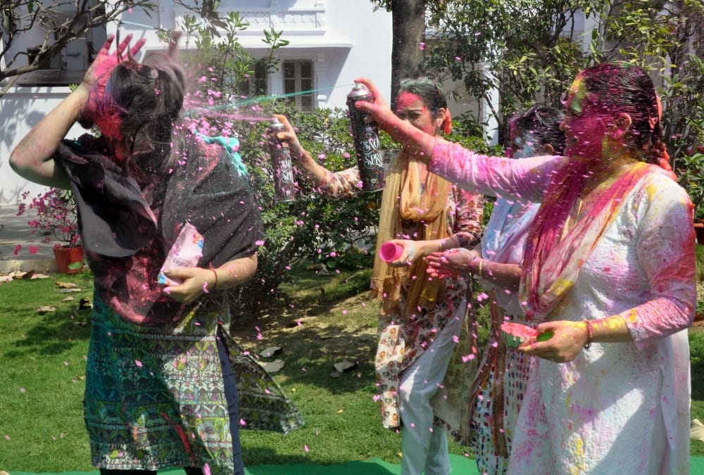 mulayam singh's younger daughter in law plays holi.