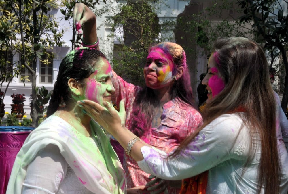mulayam singh's younger daughter in law plays holi.