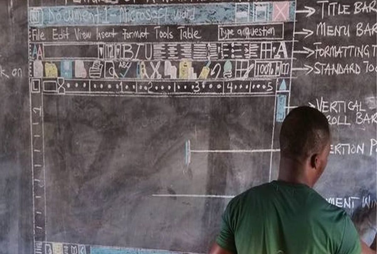 A Man in Ghana teaching computing without computers