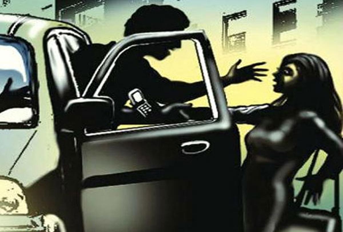 Forcibly trying to put the girl in car