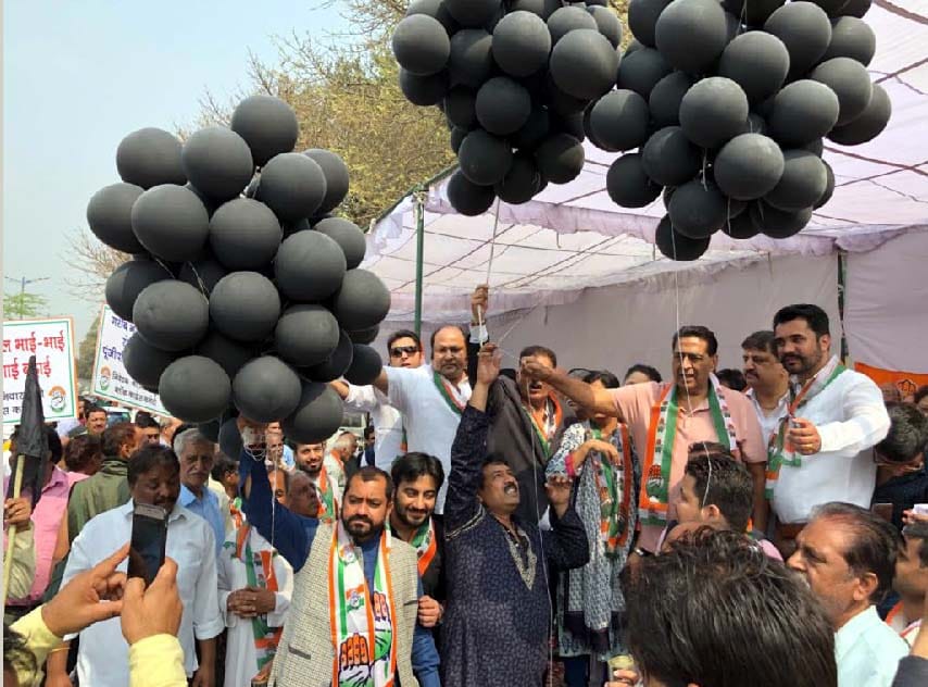  expressing their displeasure against the government's policies through Black balloons