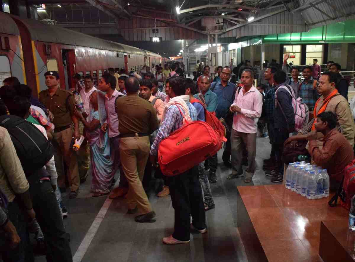 heavy rush of paasengers at railway station and bus stand after holi