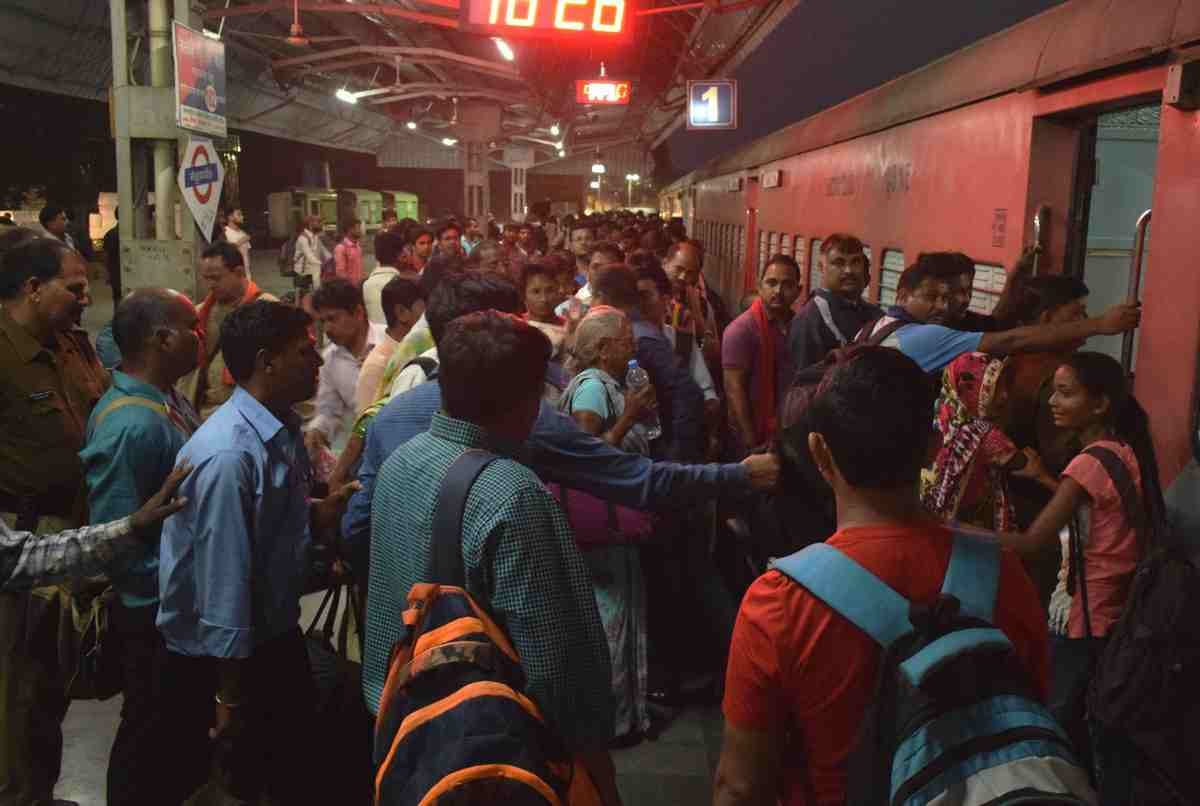 heavy rush of paasengers at railway station and bus stand after holi