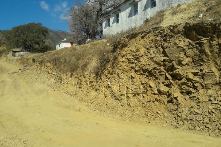 Land of the school cut for road