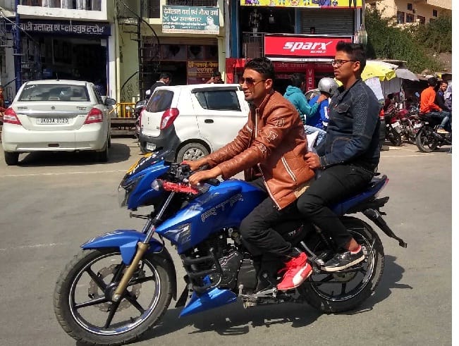 Two-wheelers driving flames of rules