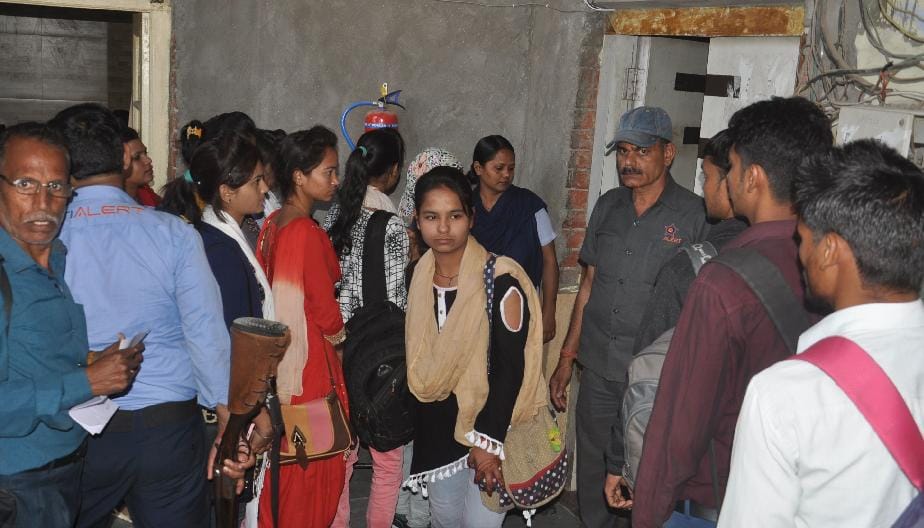 college director protest in agra university campus