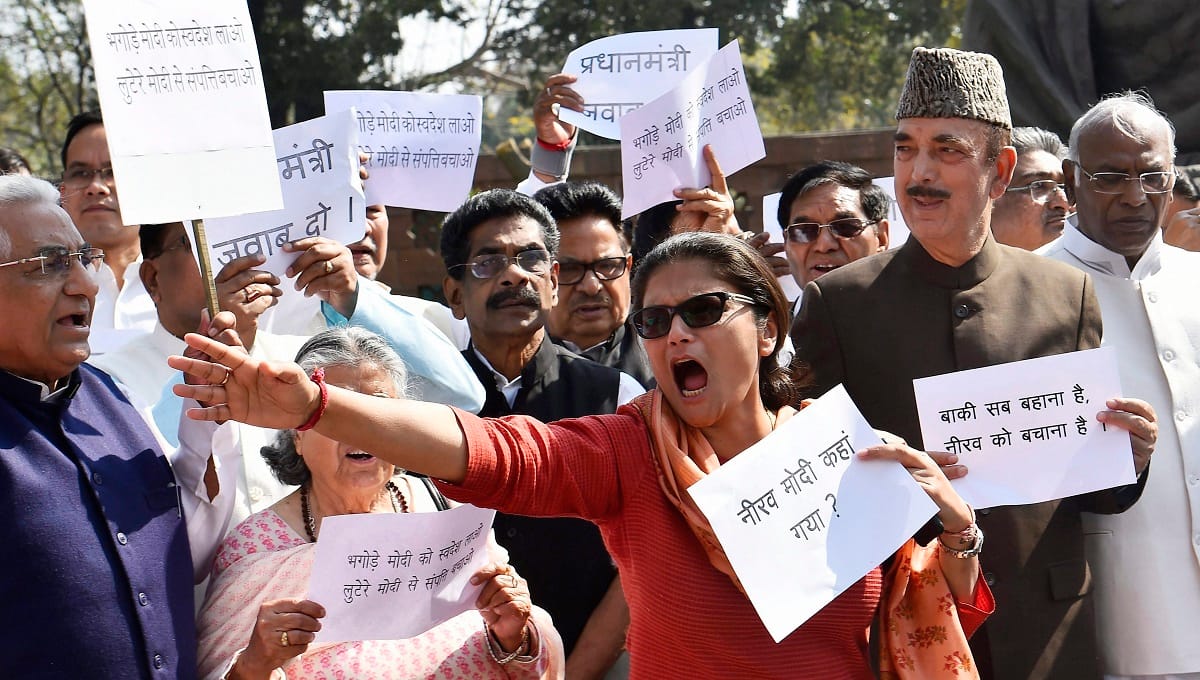 Rahul Gandhi with party members during a protest over the PNB fraud at Parliament
