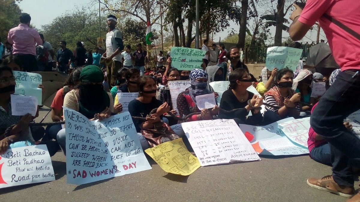 protest against SSC scam on international womens day by students
