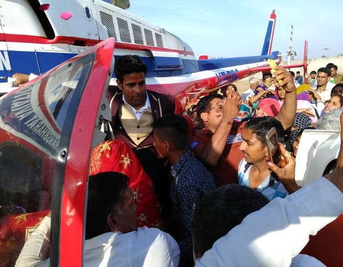 unique marriage, rohtak bride farewll via helicopter