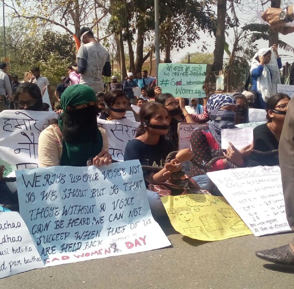 protest against SSC scam on international womens day by students