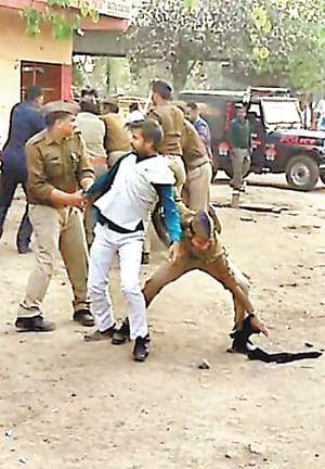 CM flashes black flags, two arrested