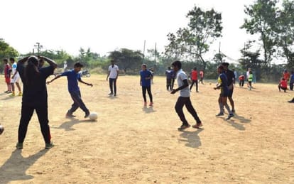father and son Kicking poverty illiteracy out of life through football