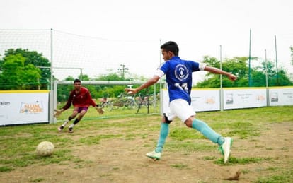 father and son Kicking poverty illiteracy out of life through football