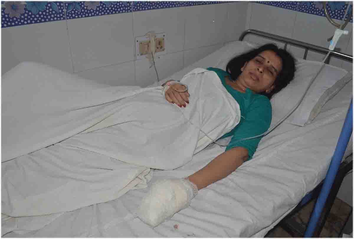woman wounded in gun shot
