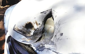 Bishop Johnson bombed, hurled at the car outside the school