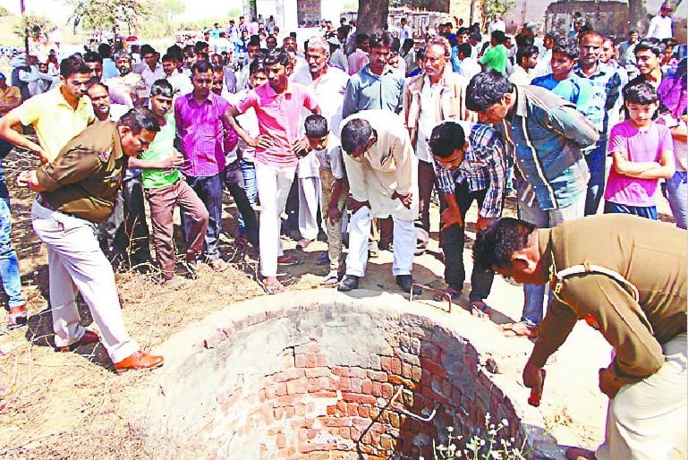 Missing son's body found in well