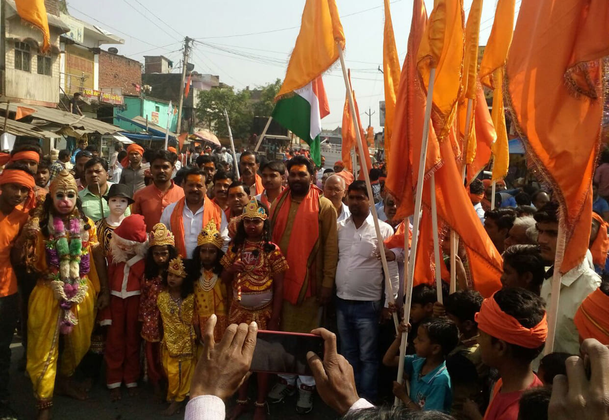 Shobha yatra with saffron flag.