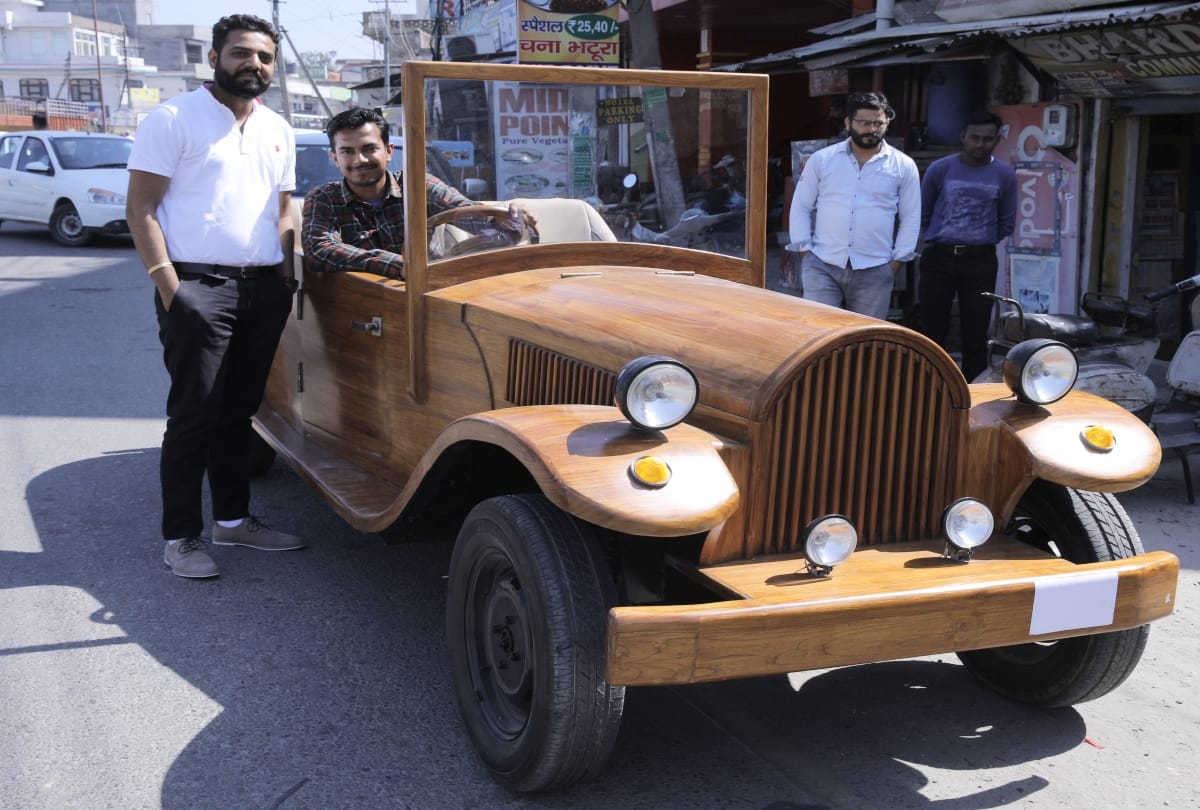 boy made a vintage car from wood at una