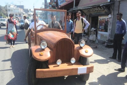 boy made a vintage car from wood at una