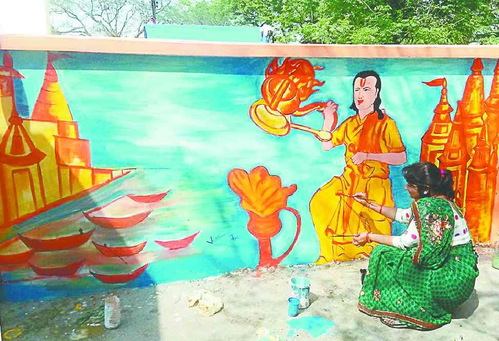 The painters filled the color of reverence on the Ganga Barrage ghat