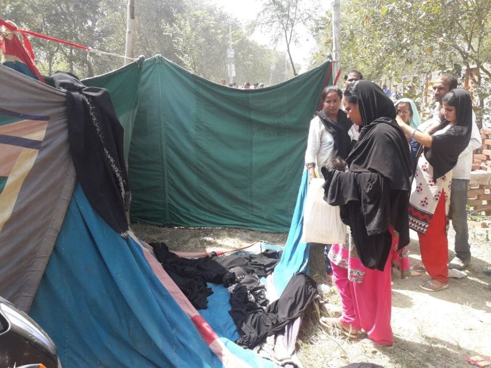 burqa removed from muslim women in the program of chief minister yogi adityanath