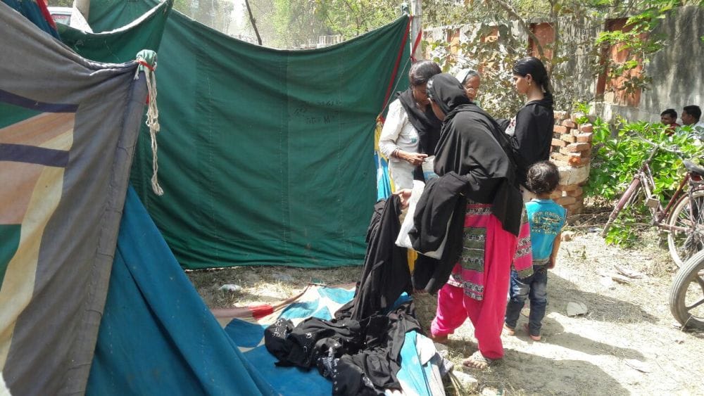 burqa removed from muslim women in the program of chief minister yogi adityanath
