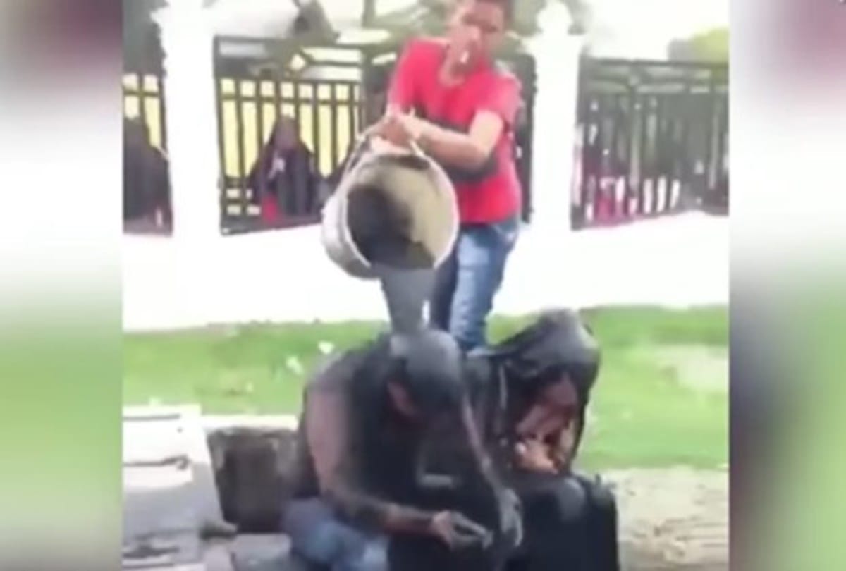 Video being viral of a couple who punished sewage waste dumped on their heads at indonesia