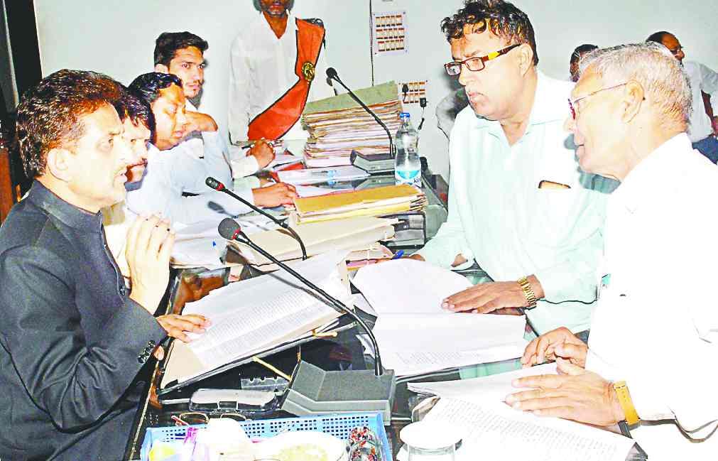  fines imposed on 14 officials