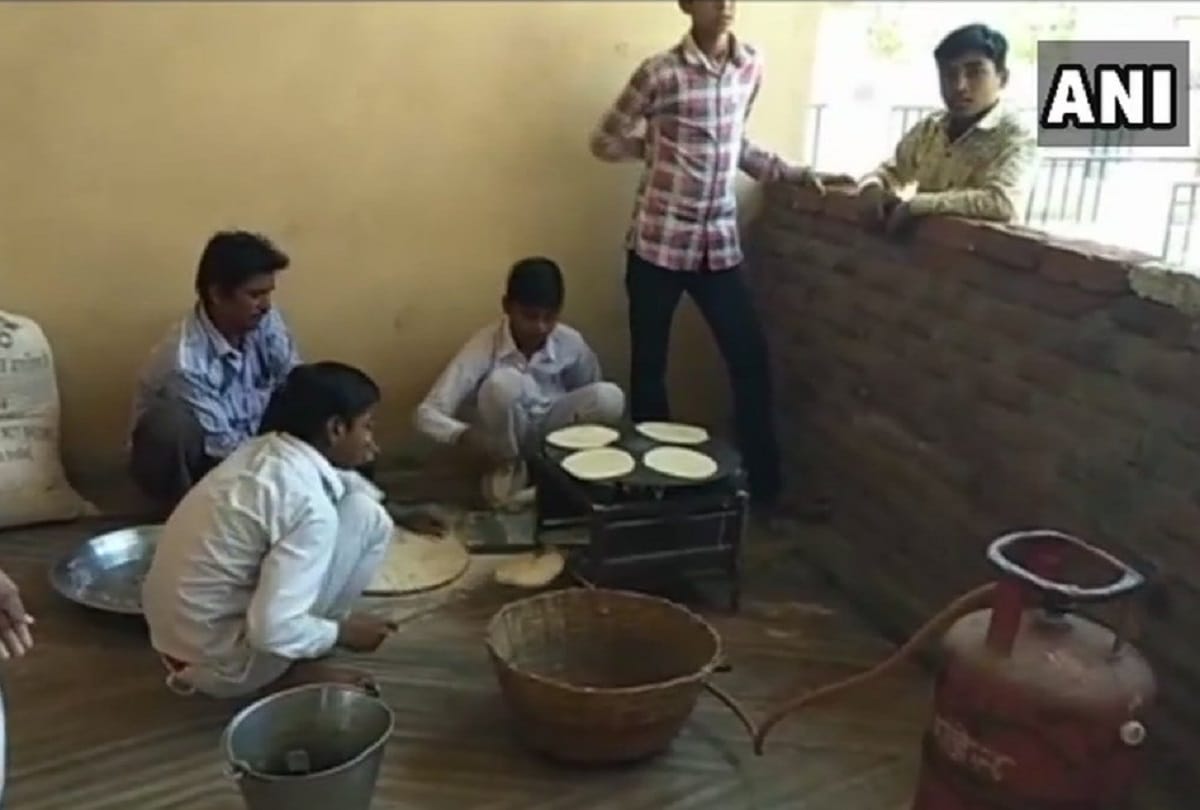 Students seen making chapatis at Tribal Students' Hostel yesterday warden has been suspended