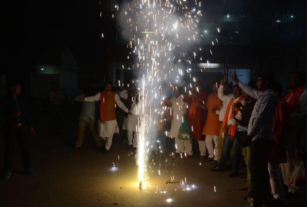 BJP celebrates victory after winning rajyasabha election.