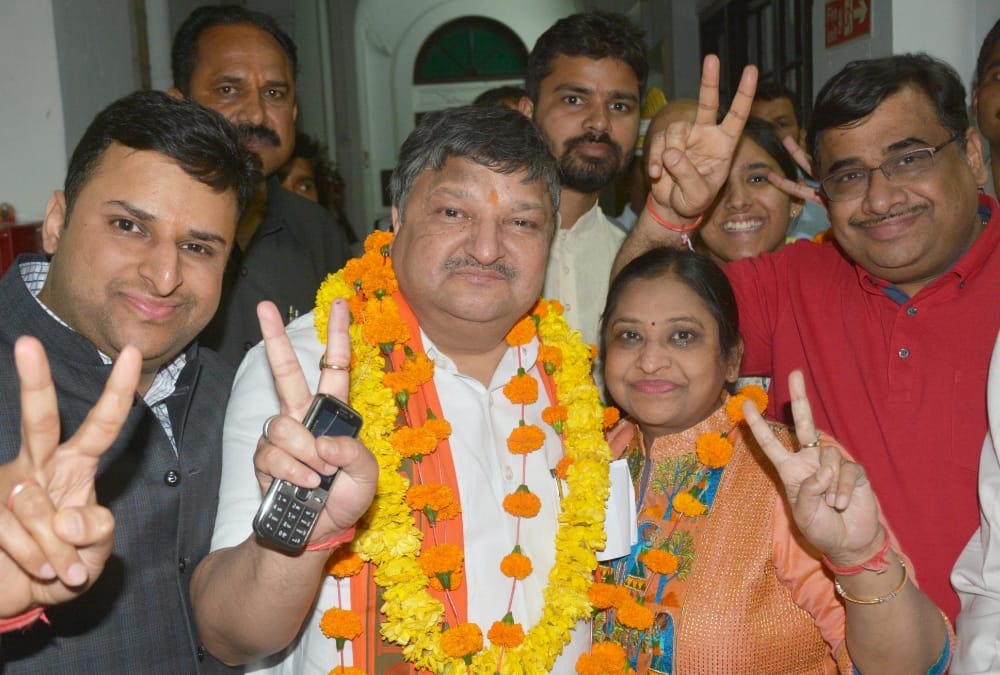 BJP celebrates victory after winning rajyasabha election.