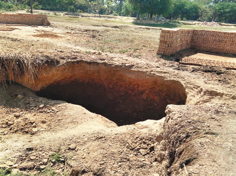 Mother died due to soil collapse, father injured