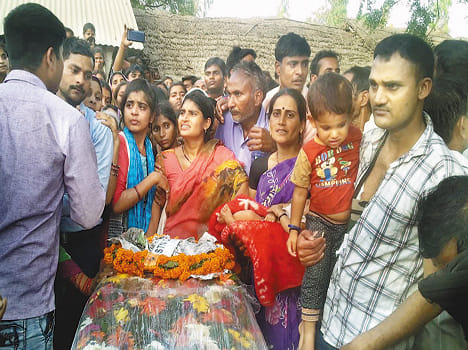 When the body of the soldier reached the village,