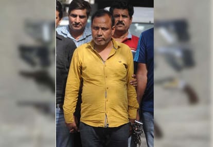 Special cell arrested weapon smuggler with 17 pistols and 10 extra magazines