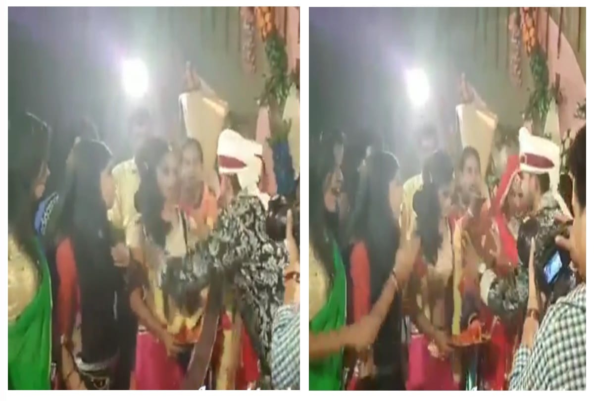 Watct Viral Video of groom putting varmala in someone elses neck instead of bride