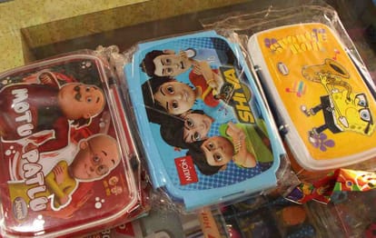 Cartoon character bag and bottle and tiffin available in market